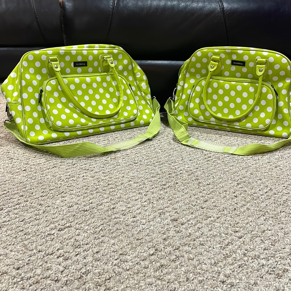 2 Olympus duffle luggage.  Larger one is 18x11.5x8.  Smaller one is 16…